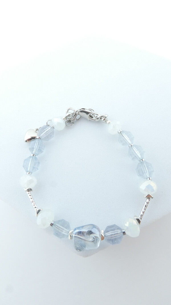 Armband met blauwe topaas edelstenen en Oosters glas